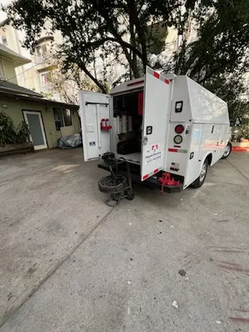 Magnet Plumbing service vehicle on-site for Grease Trap Cleaning in San Marcos